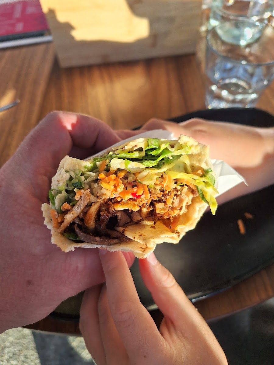 A chicken kebab wrap, cut open